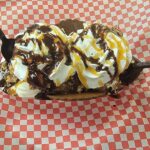 Chocolate and caramel sundae in a waffle bowl