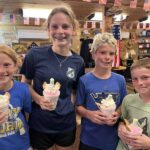 Family enjoying ice cream on Table Rock Lake dock